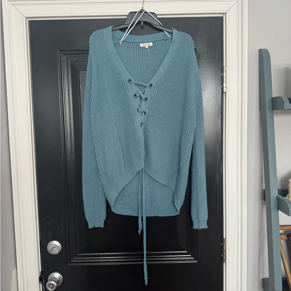 Miracle • Blue V-Neck Sweater with Lace-Up Detail